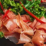 Prosciutto di Parma DOP: visita ai prosciuttifici e degustazioni nella Food Valley emiliana